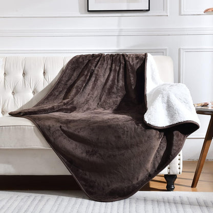 Yaning 50x60 inches waterproof throw blanket style presentation on a couch