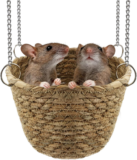 Jevnd natural grass rat hammock front view hanging inside a wire cage.