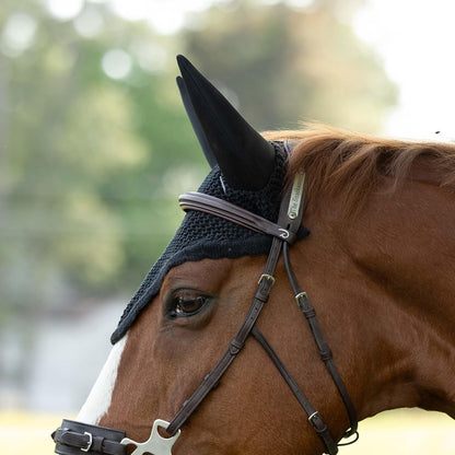 Side profile of Horze silent ear net on horse