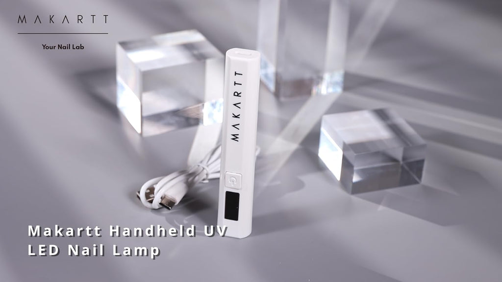 Makartt handheld UV light packaged with accessories for home and salon use