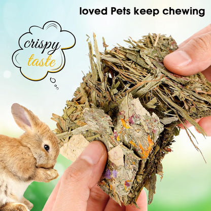 Natural plant based small animal chew toys showing the rich green grass texture and dried flower petals.