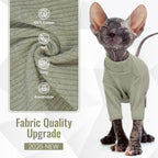 Sphynx cat wearing green Dentrun turtleneck pullover