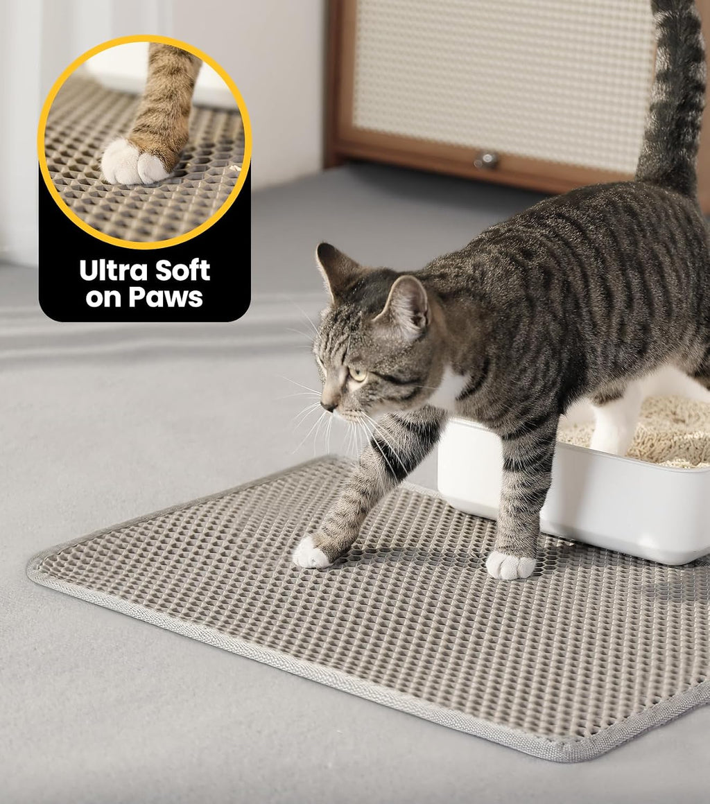 Easy clean cat litter trapping mat being rinsed with water