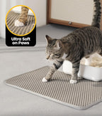 Easy clean cat litter trapping mat being rinsed with water