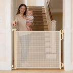 Spaceany Retractable Safety Baby Gate front view in cream color stretched across a doorway