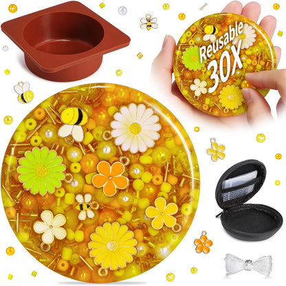 PLUMIA Reusable Picking Fidget Pad front view showing yellow honey bee design and embedded beads.
