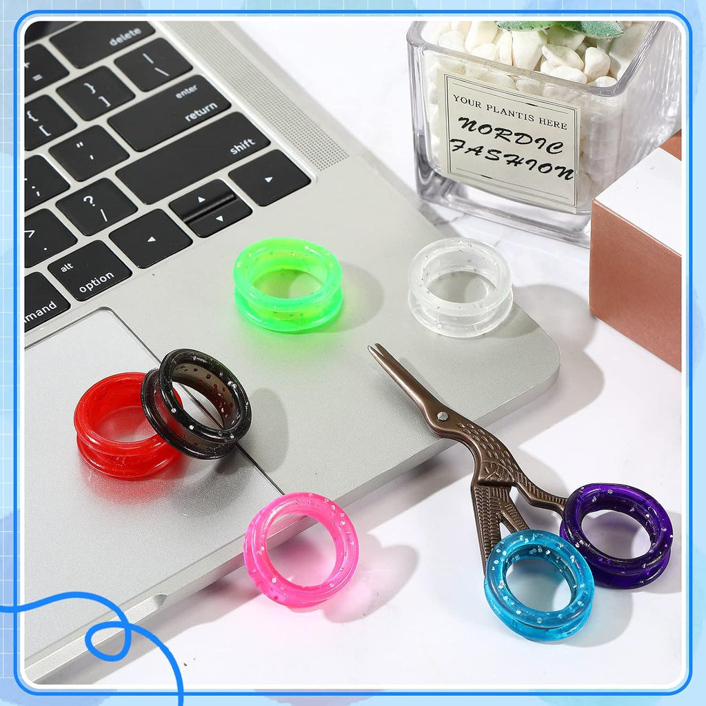 Multi color silicone scissor ring grips display highlighting eight different shades