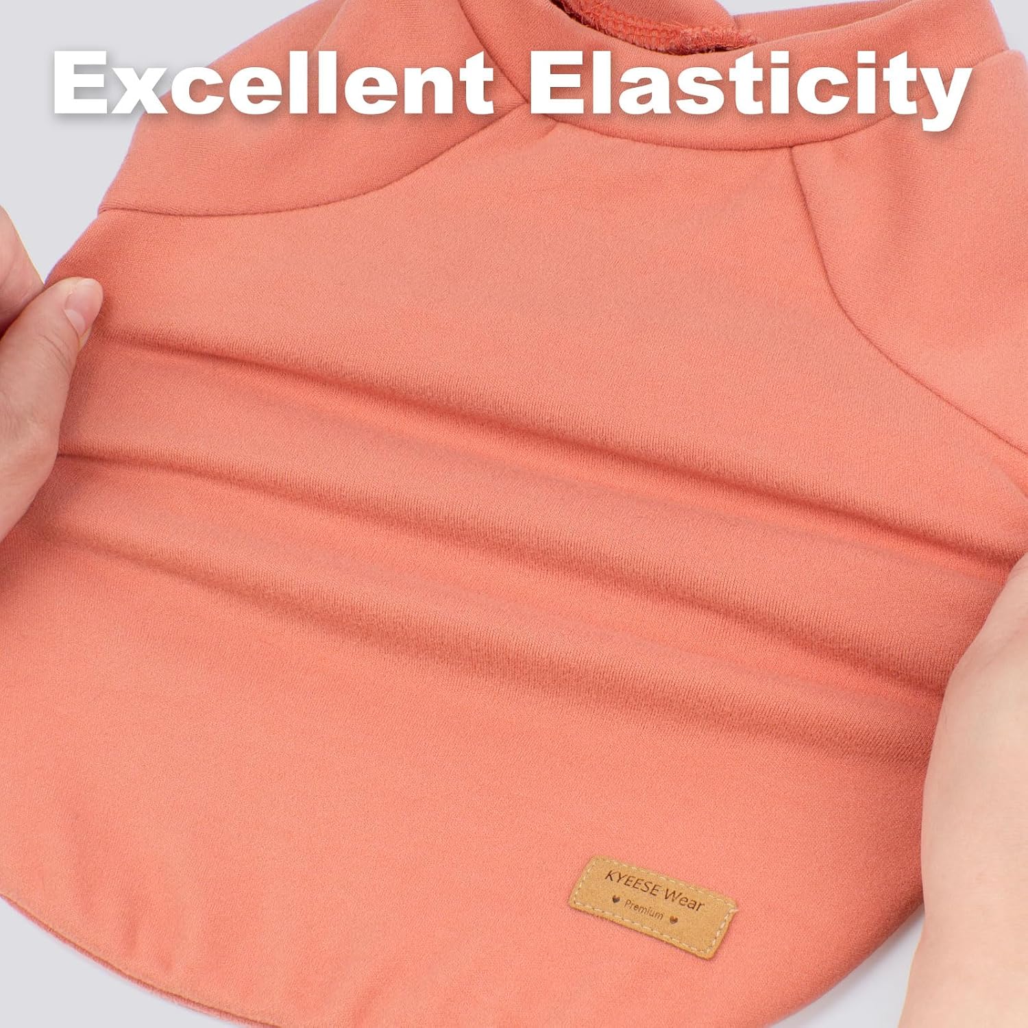 Sleeveless elastic dog apparel pack showcasing fabric stretchability