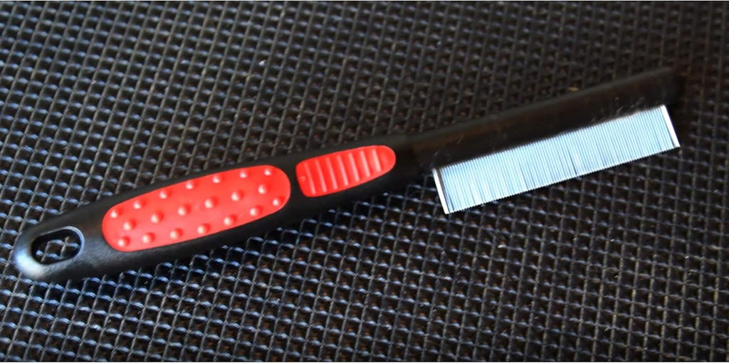 Close up of stainless steel pins on Paw Brothers flea comb for dogs