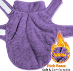 Reversible fleece dog jacket showing two soft textures.