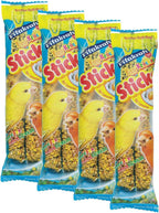 Canary eating Vitakraft egg and honey crunch stick in cage