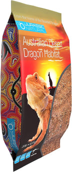 Bearded dragon terrarium setup using authentic Australian desert red sand substrate.