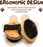 The Buddy System palm brush underside showing the densely packed soft boar bristles for gentle pet grooming.