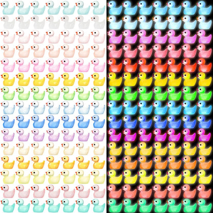 JIUZHU mini ducks glow in the dark luminous resin figurines front view showing fifteen different colors.
