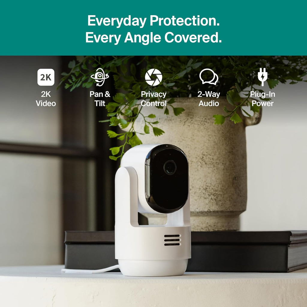 Arlo security camera with privacy shield in down position