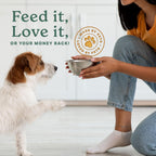 Adult dog enjoying food mixed with The Missing Link supplement