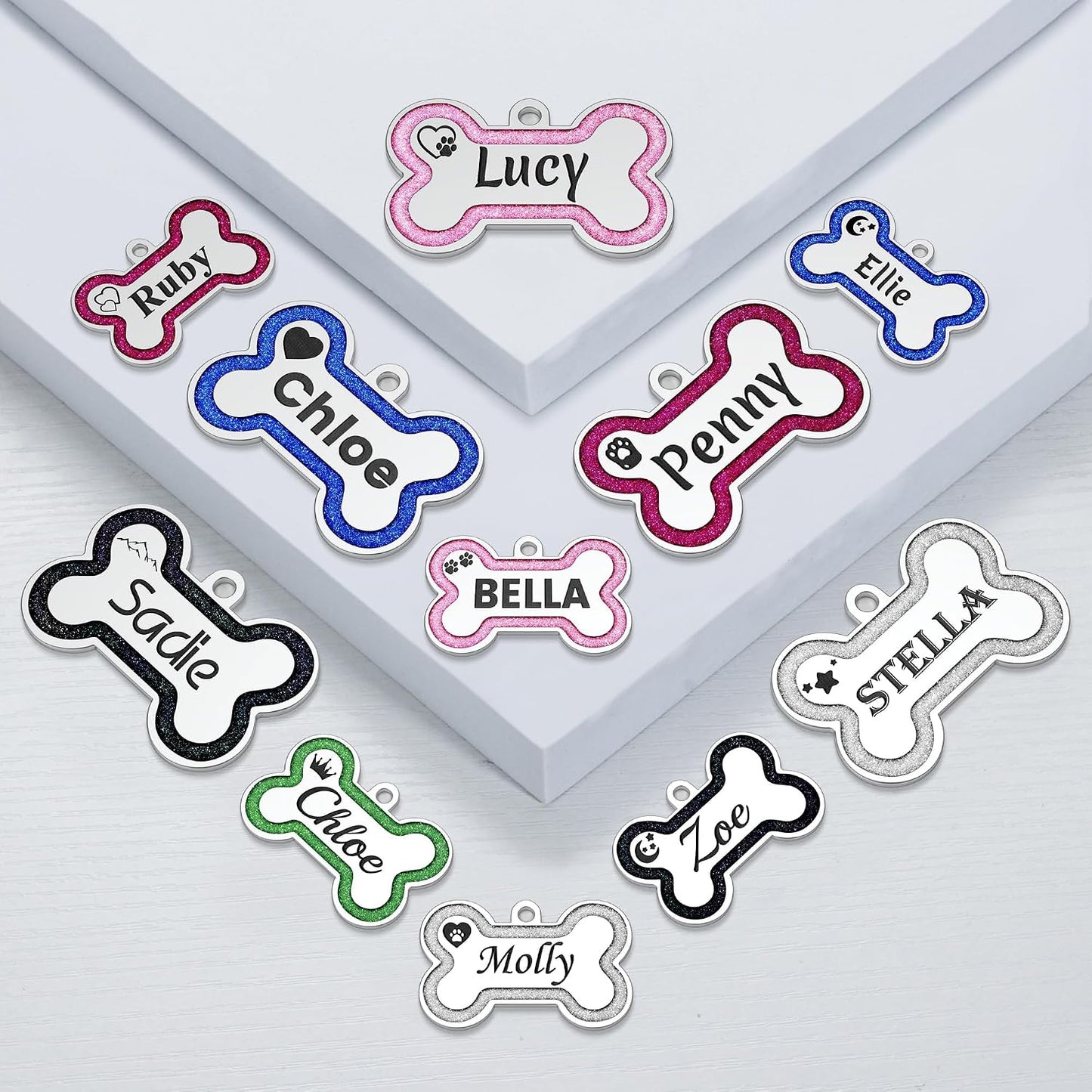 Double sided engraved pet name tag with durable stainless steel split rings attached.