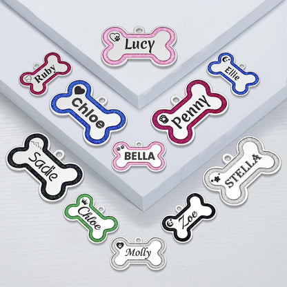 Double sided engraved pet name tag with durable stainless steel split rings attached.