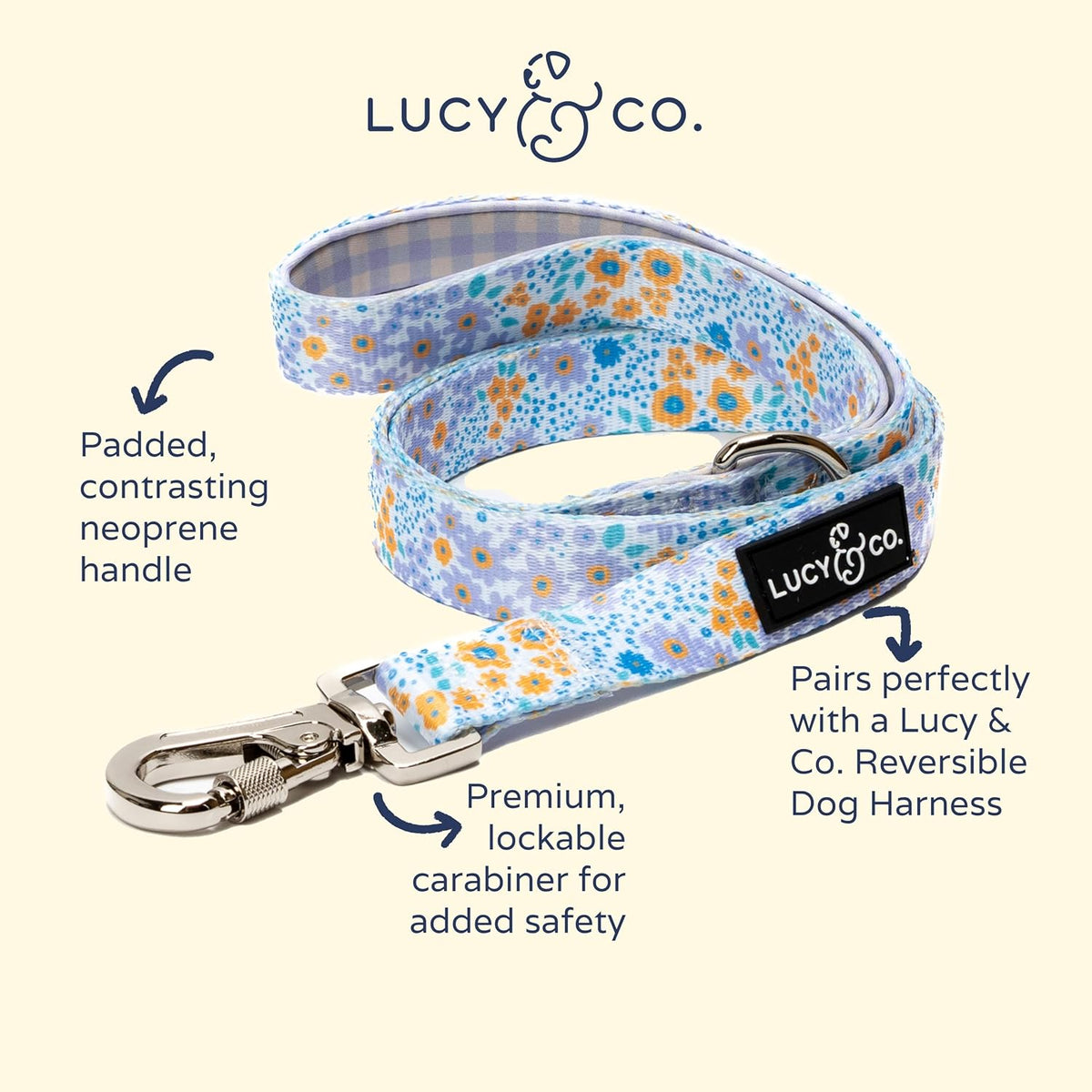 Close up of the thick padded neoprene handle on the purple floral pet lead.