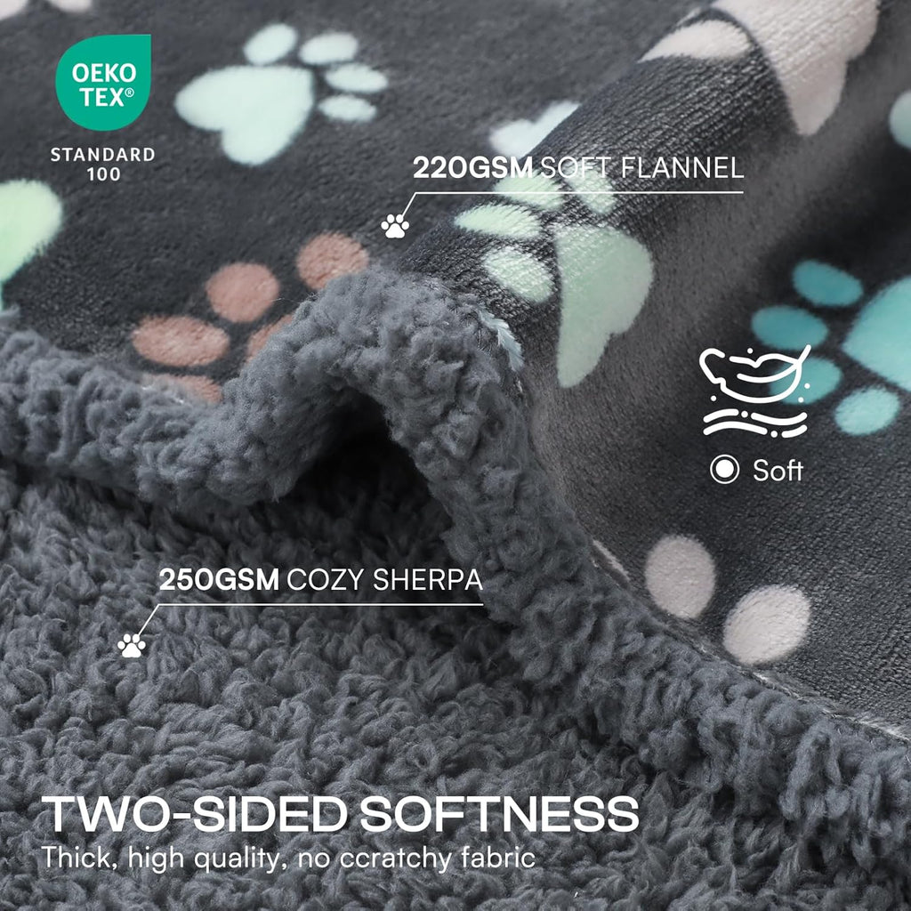 Luciphia dog blanket grey paw print pattern close up