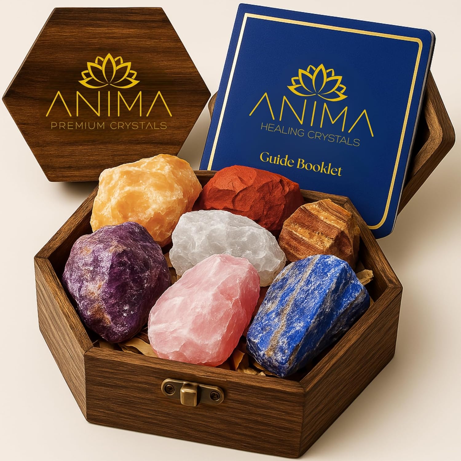 Anima Premium 7 Chakra Healing Crystals Set front view showcasing raw stones in an etched hexagonal wooden box.
