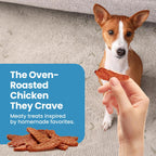 Dog enjoying Blue Buffalo Nudges chicken jerky snack
