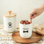 Set of two white decorative metal jars for dog food and treats
