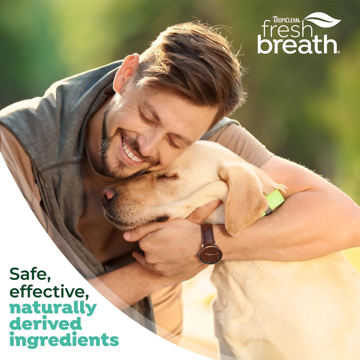 TropiClean Fresh Breath dog toothbrush angled view highlighting the green and white premium build