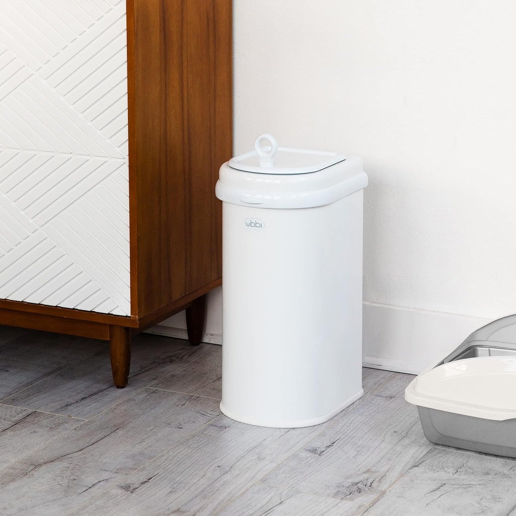 Ubbi pet waste pail with standard trash bag installed