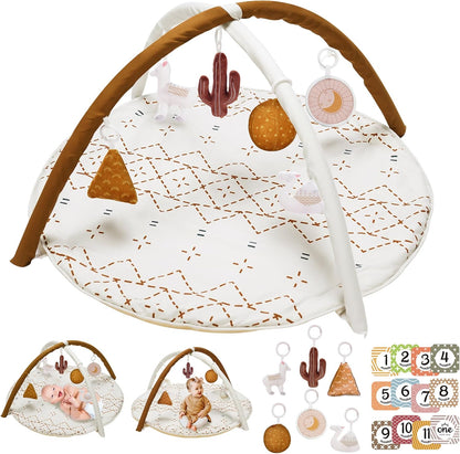 Little Dove macrame baby play gym mat front view showing neutral khaki color scheme