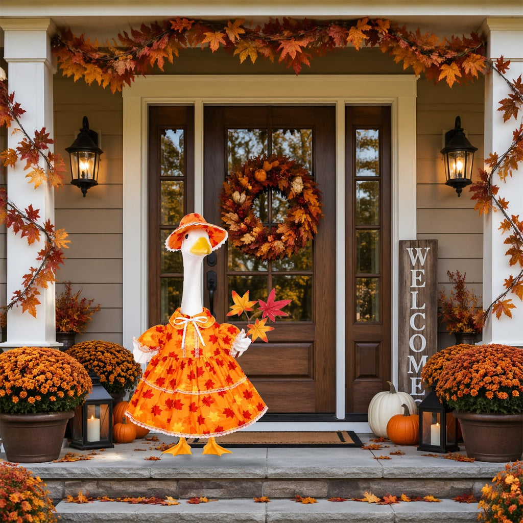 Close up of Thanksgiving holiday decor fabric on a concrete goose ornament
