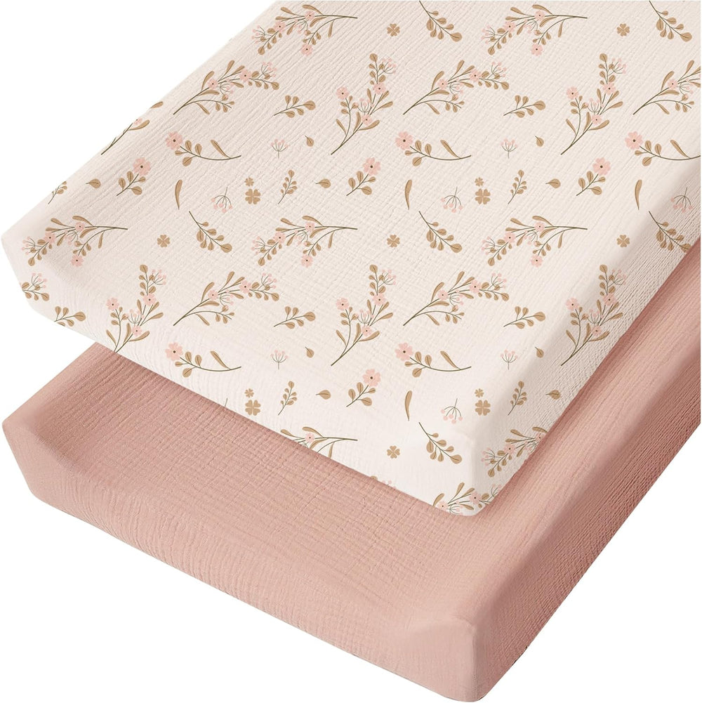 Konssy muslin changing pad cover front view showing floral and pink design