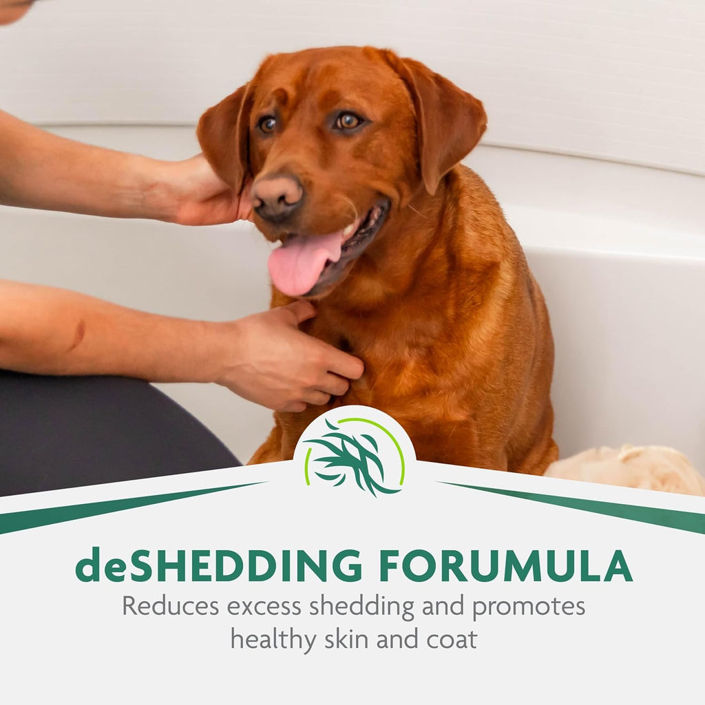 FURminator Ultra Premium shampoo bottle next to grooming brush