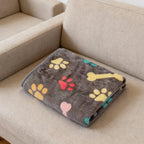 Durable and washable cat blanket fabric texture in soft pink color.