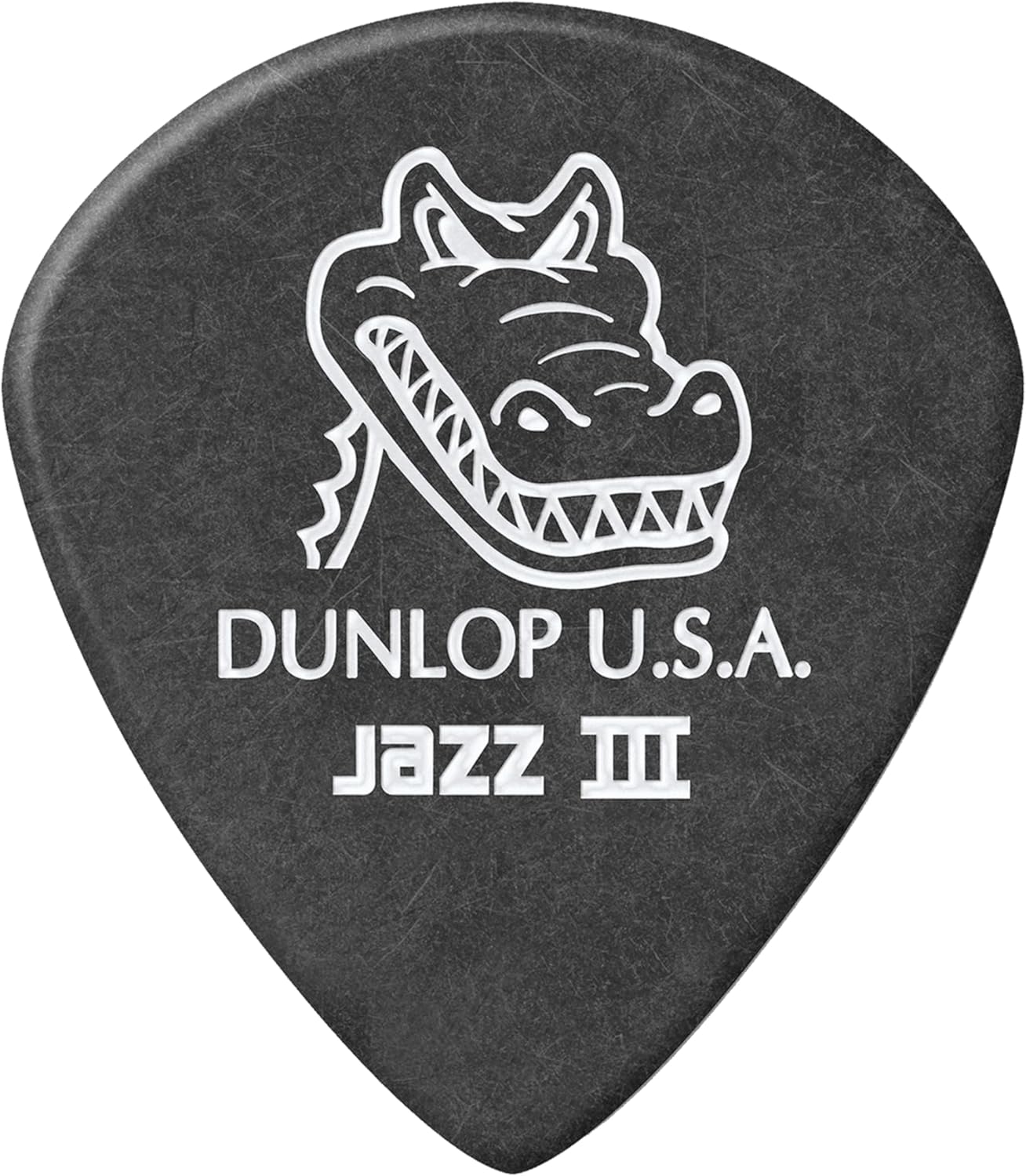 Close up shot highlighting the molded beveled edge profile of the Dunlop 1.4mm guitar pick.