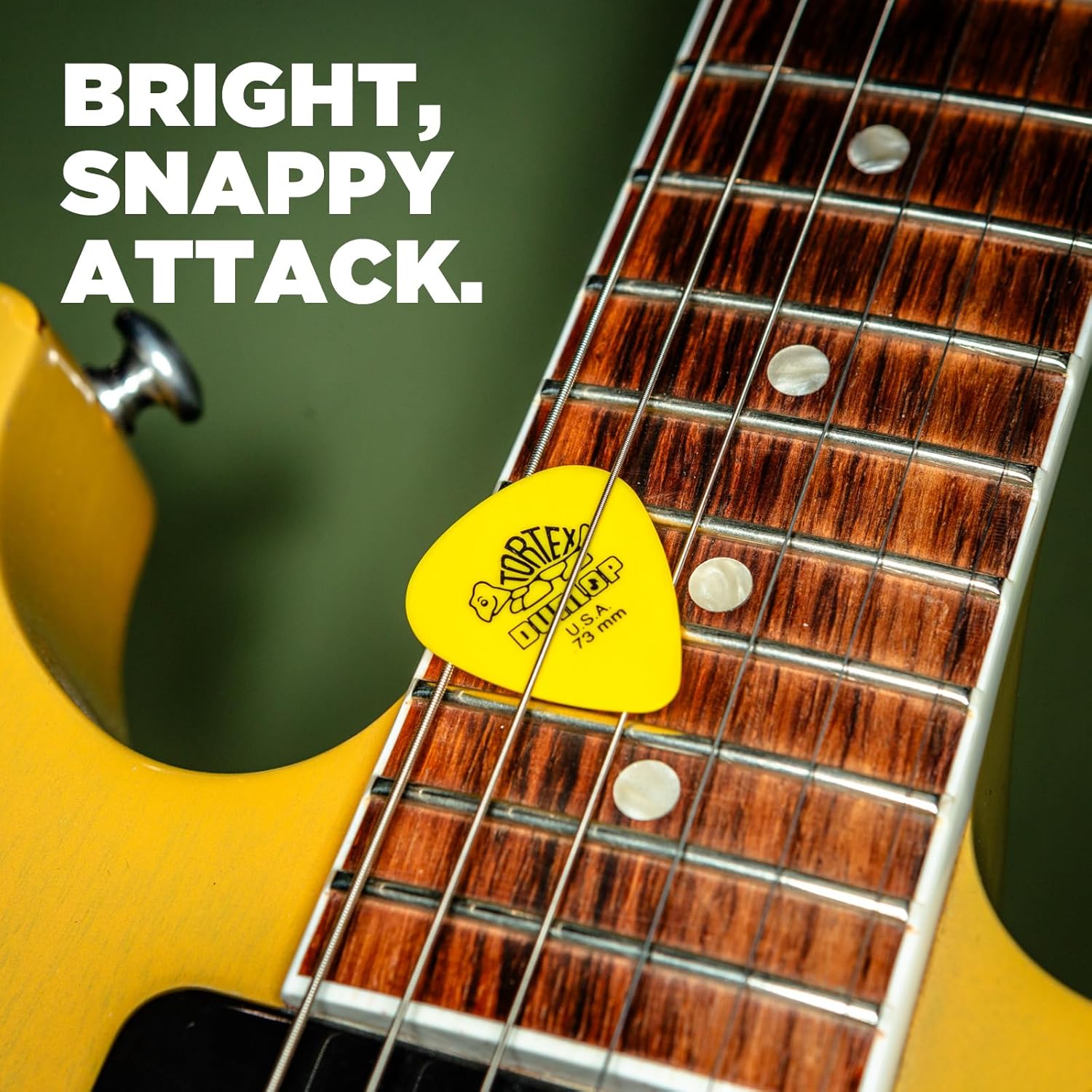 Close up of the grip enhancing matte surface on a Jim Dunlop Tortex 0.50mm plectrum.