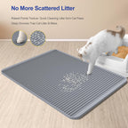Large waterproof cat litter box mat laid out flat on a wooden floor.