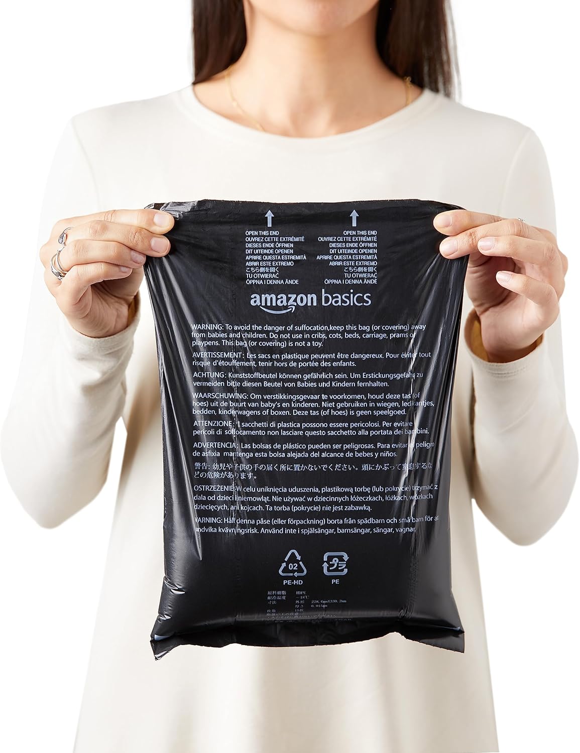 Amazon Basics large leak proof dog bags showing the thirteen by nine inch dimensions.