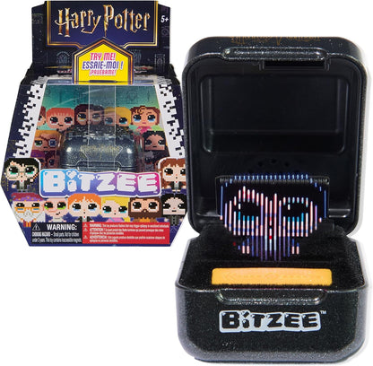 Bitzee Wizarding World Harry Potter interactive digital pet toy closed pod front view showing gold Hogwarts crest