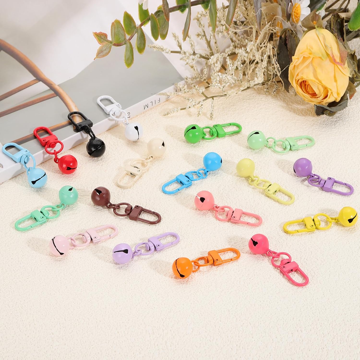 PATIKIL lightweight cat collar bell showing the secure snap closure mechanism