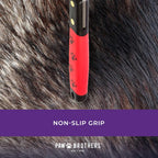 Ergonomic non-slip handle detail of Ryan's Pet Supplies dog shedding brush
