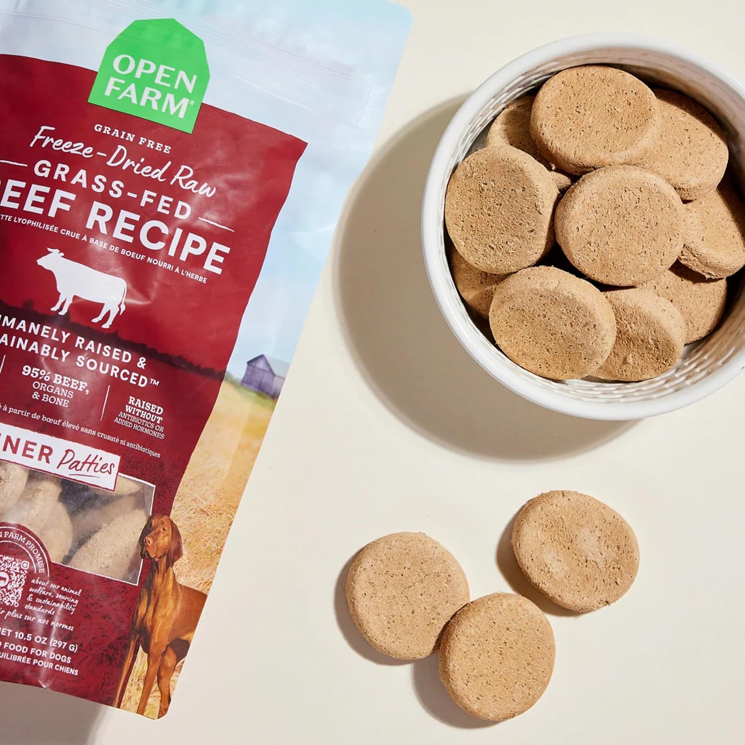 Open Farm raw dog food patties showing ninety five percent meat content text