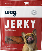 Hand holding Wag soft and tender jerky treats
