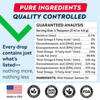 STRELLALAB liquid salmon oil for pets displaying easy application dispensing pump mechanism.