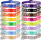 Full collection of sixteen solid color imported Waoduld cat collars arranged neatly by shade