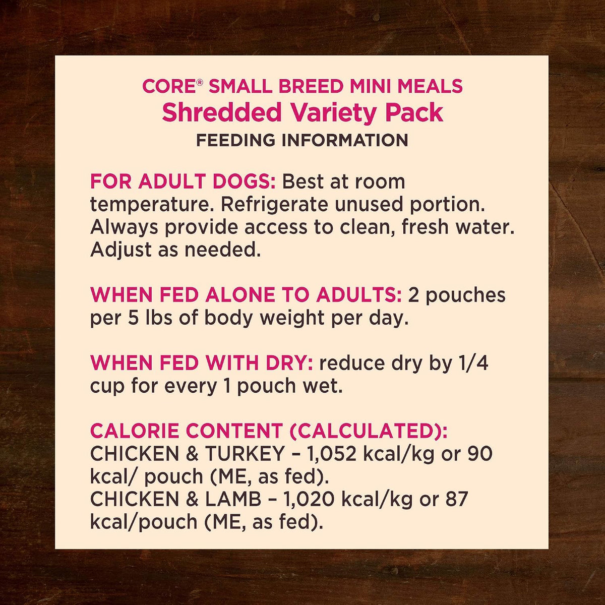 Small dog eating Wellness CORE shredded mini meal from a bowl