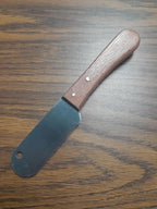 Tamsco pet grooming tool showing 3-inch stainless steel blade close up