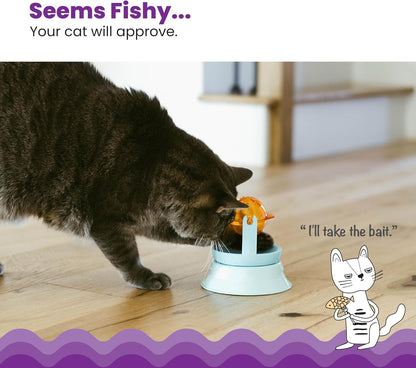 Catstages interactive cat puzzle toy being used as a slow feeder for indoor cat enrichment.