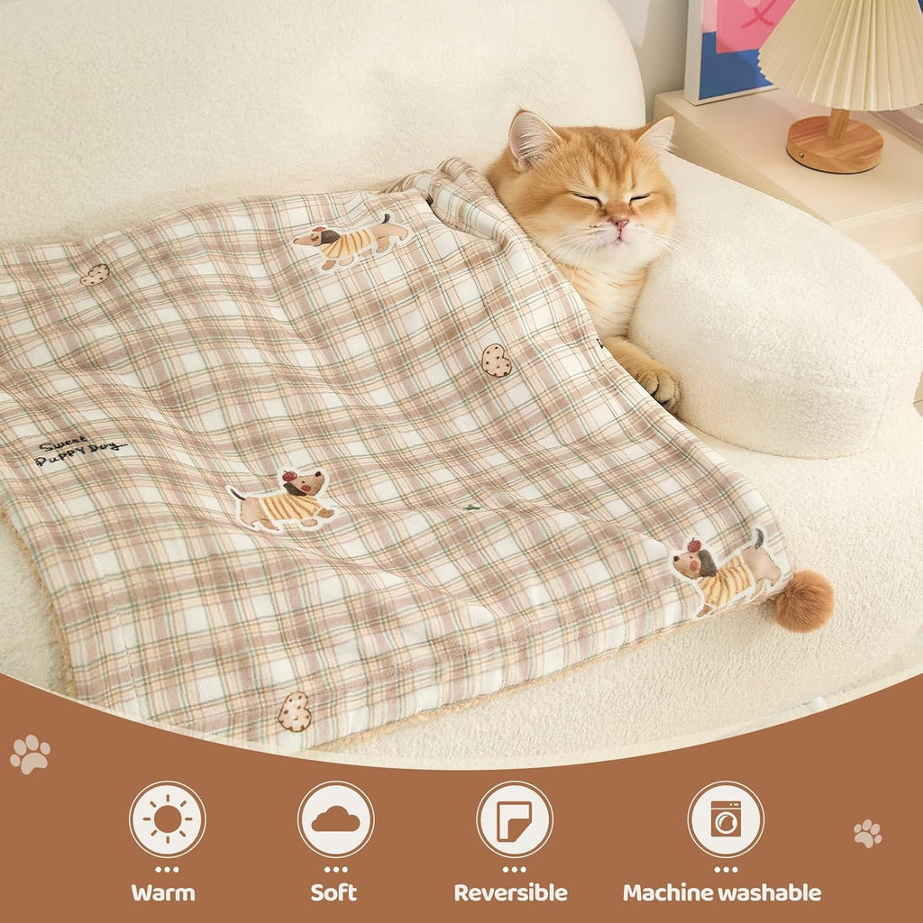 Jiupety plush cat blanket spread across a clean white bed