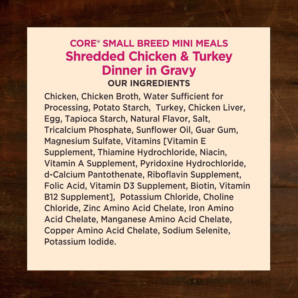 Small breed dog eating Wellness Core wet food